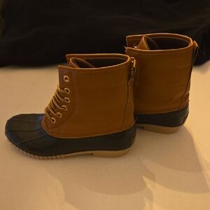 Tan and Black Lace-Up Boots